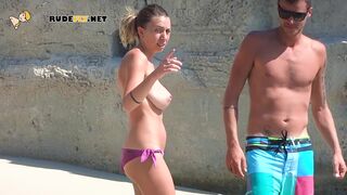 Nude beach girl filmed by a voyeur completely naked on the beach